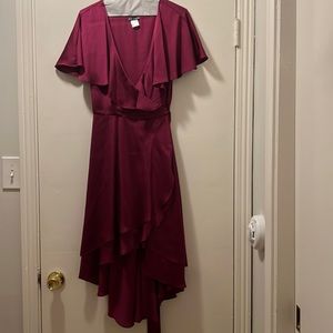 This plum colored dress size medium never been worn